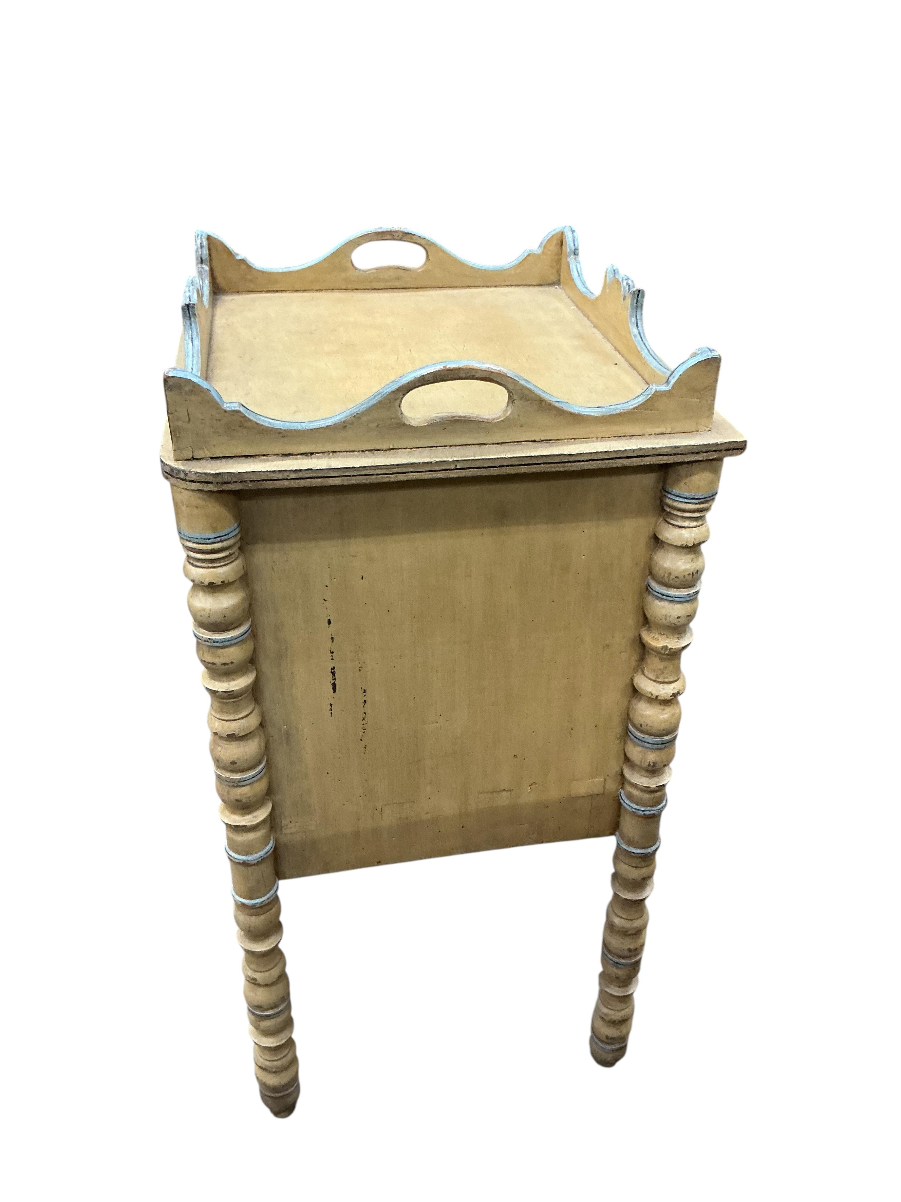 A 19th century painted pine tray top bedside cabinet, width 38cm, depth 35cm, height 71cm
